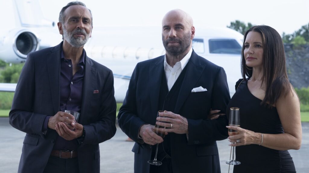 John Travolta dan Kristin Davies di film Cash Out