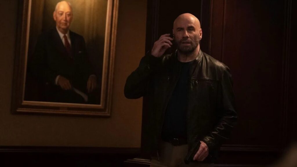 John Travolta sebagai Mason di film Cash Out